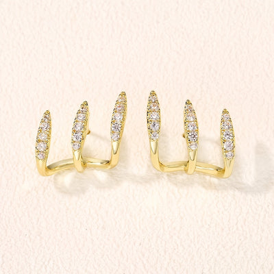 Elegantne naušnice sa tri kandže ukrašene draguljima