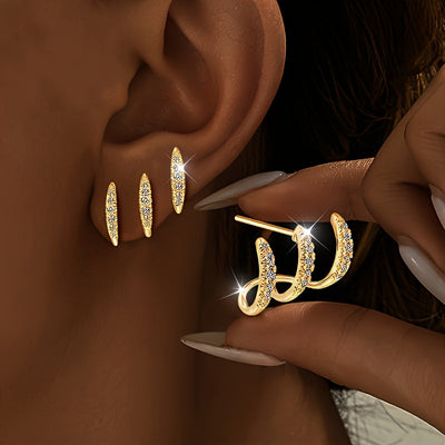 Elegantne naušnice sa tri kandže ukrašene draguljima