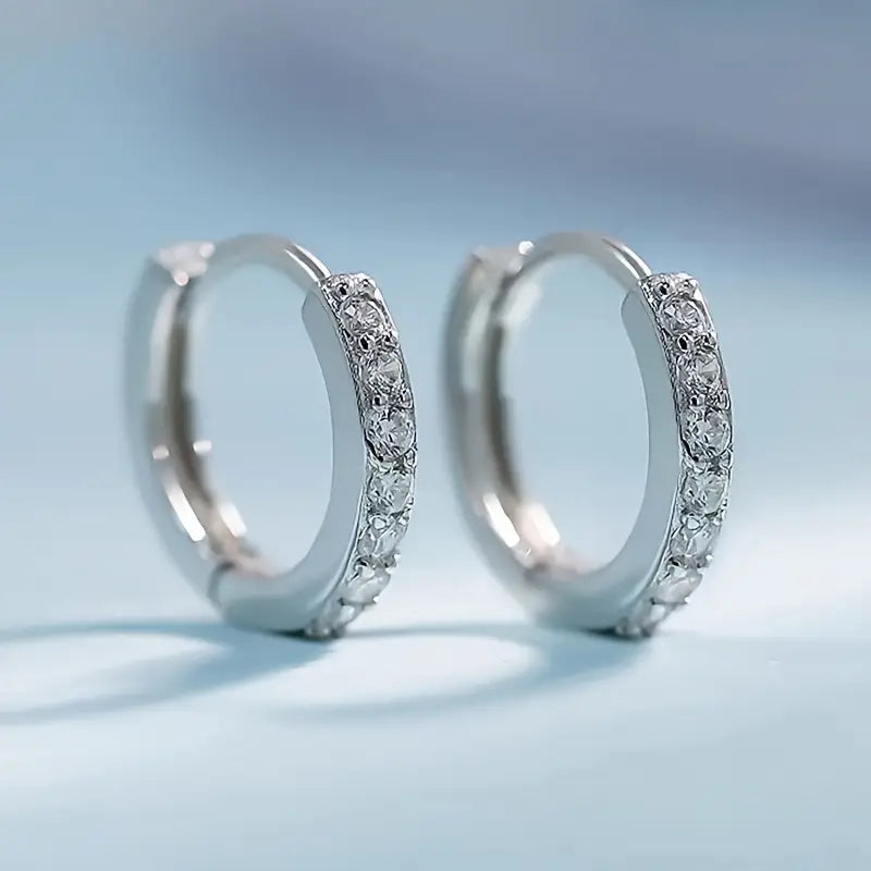 Naušnice u obliku zlatnog kapi inspirisane obalom